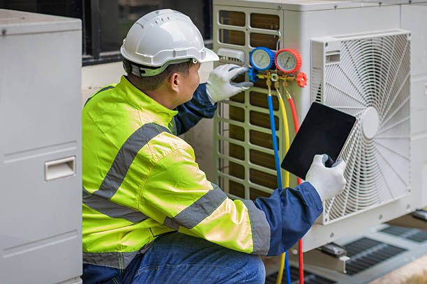 Professional Hvac technician working in Pembroke, MA